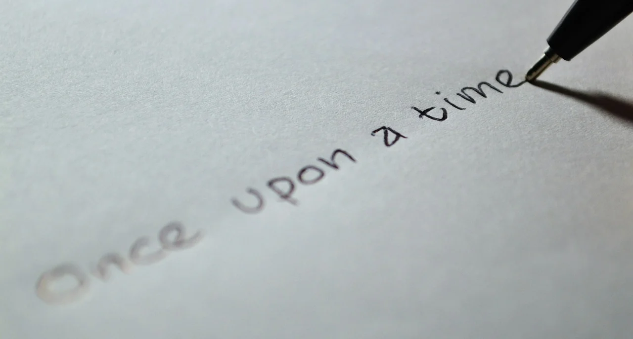 Synopsis Best Close up of pen writing "Once upon a time".